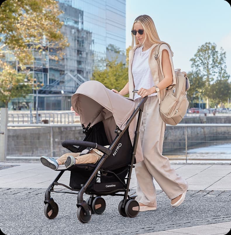 a mother and her baby in her cart