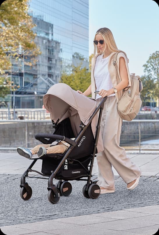 a mother and her baby in her cart